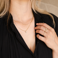 14K GOUDEN RING MET LICHTE SPINEL MAAT 16.5